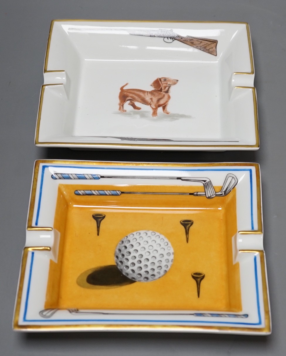 Two Hermes, Paris porcelain ashtrays: one golfing related (boxed), the other hunting related, golf ashtray 19 cms x 15 cms